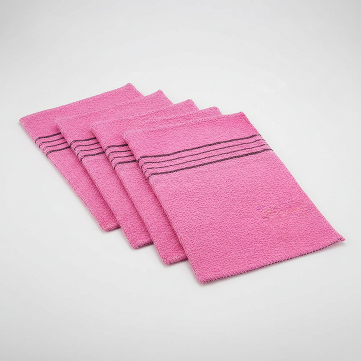 Stack of folded gentle exfoliating towels, a must-have skincare tool for sensitive skin