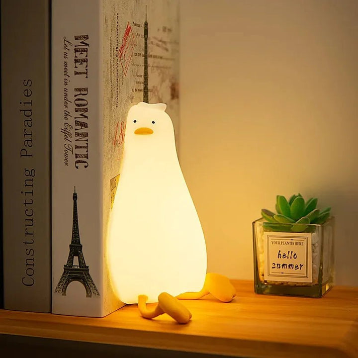 Cute animal silicone night light for toddlers, providing soothing dimmable light for peaceful sleep in their room.