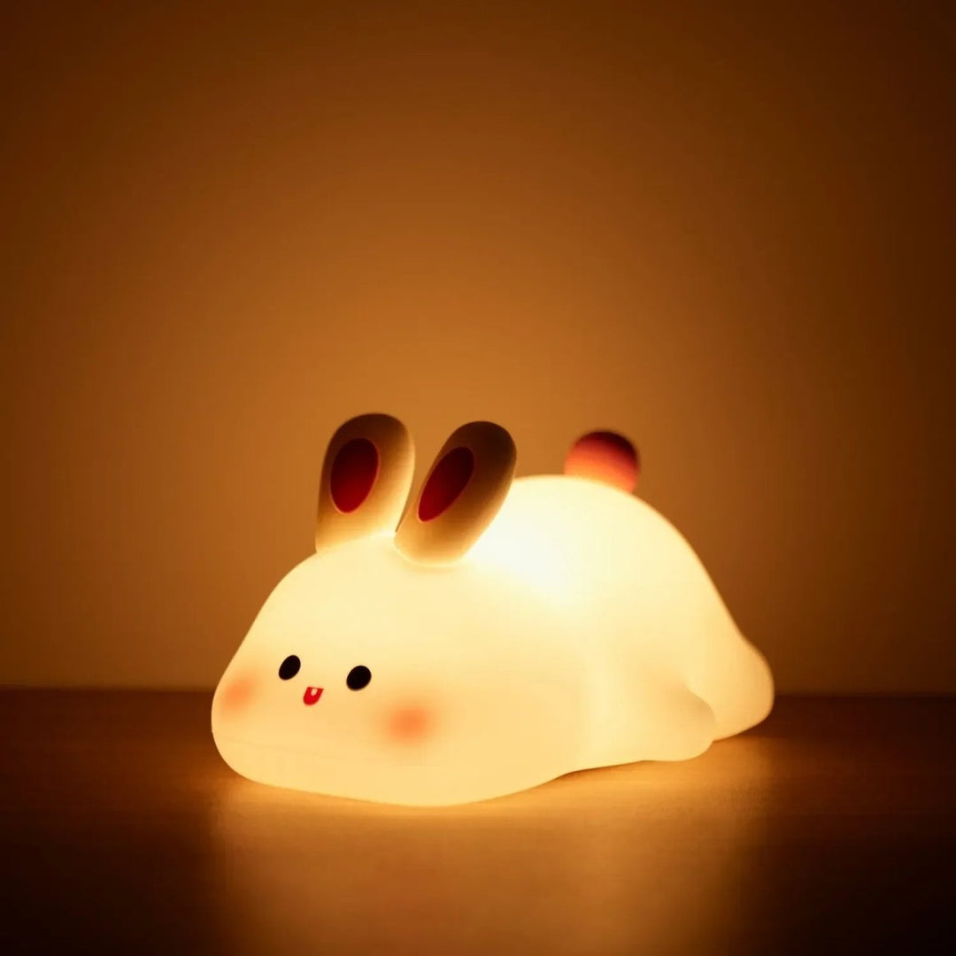 Adorable animal silicone night light, dimmable and BPA-free, provides calming glow for baby and toddler rooms.