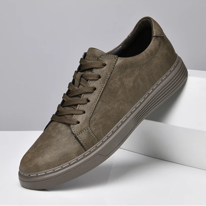 Premium genuine leather men's sneakers, offering all-day comfort & durable style.