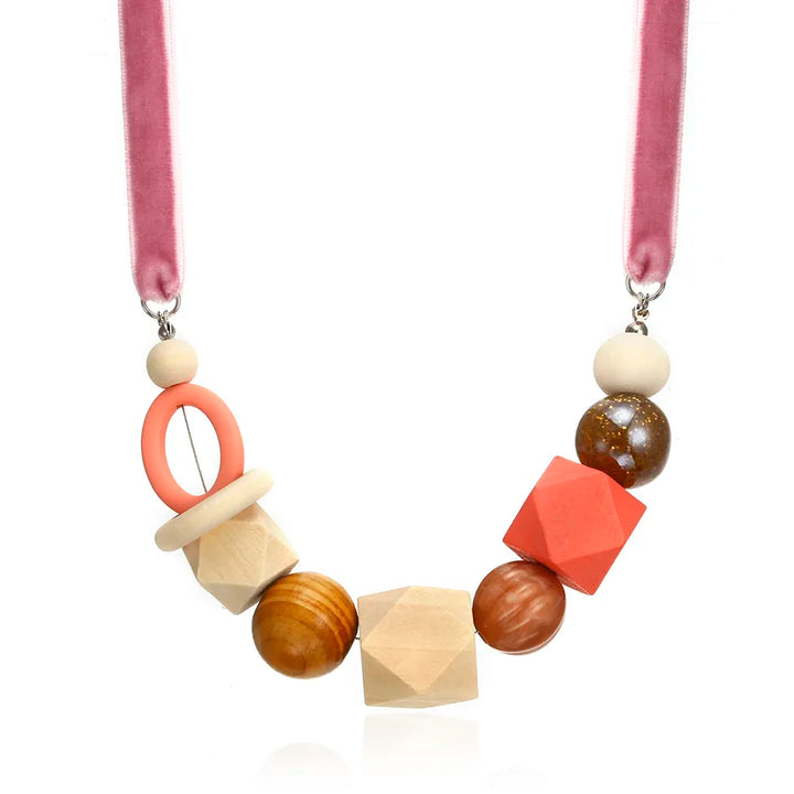 Modern artistic geometric necklace. Unique pearl & wood design, a stylish fashion accessory for women.