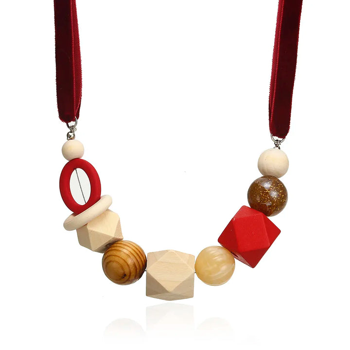 Women's geometric statement necklace with pearls & wood. Adjustable, modern design, a perfect gift.
