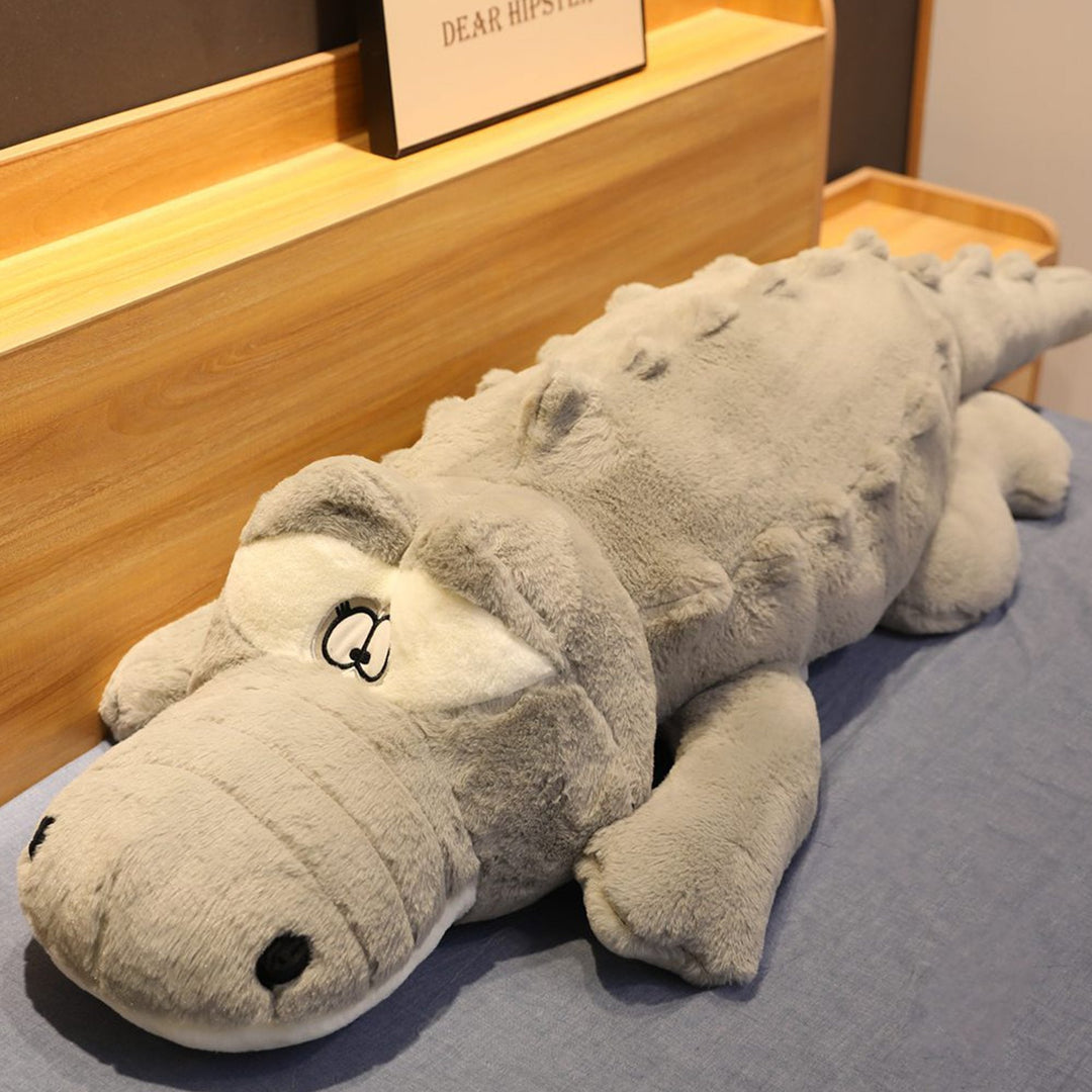 Hypoallergenic giant crocodile plush, a super soft comfort pillow and lovable stuffed animal for all ages.