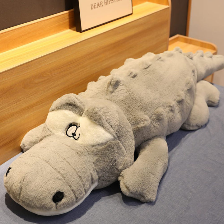 Hypoallergenic giant crocodile plush, a super soft comfort pillow and lovable stuffed animal for all ages.