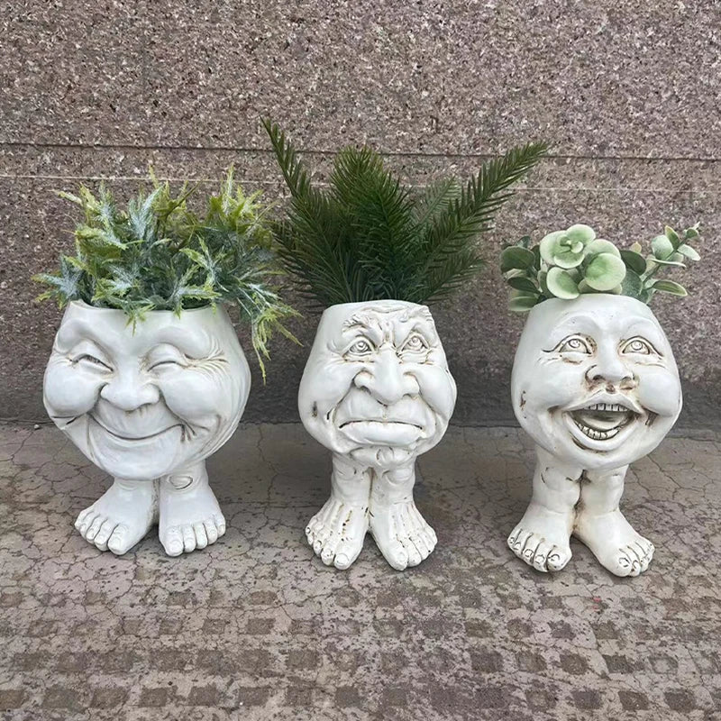 GigglePot Funny Face Resin Planter, a whimsical pot for succulents, perfect unique home & office decor accent.