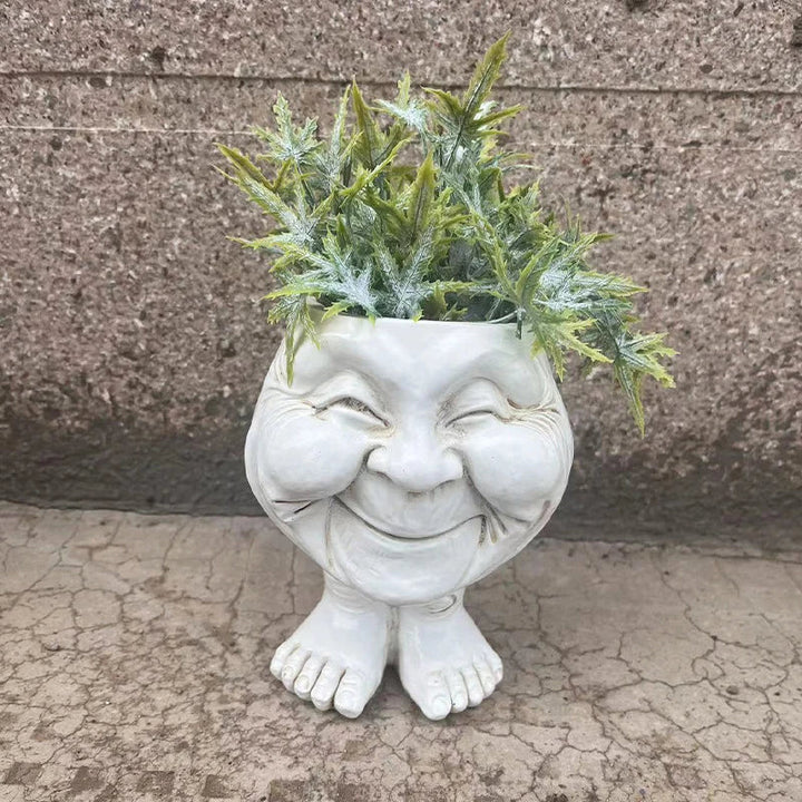 GigglePot Funny Face Resin Planter, a whimsical & cute succulent pot for unique desktop & home decor.