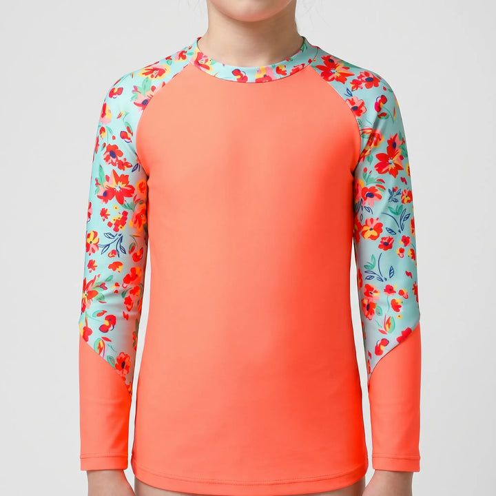 Long-sleeve swim top for girls. Rash guard offers sun protection, great for kids' summer beach & pool wear.