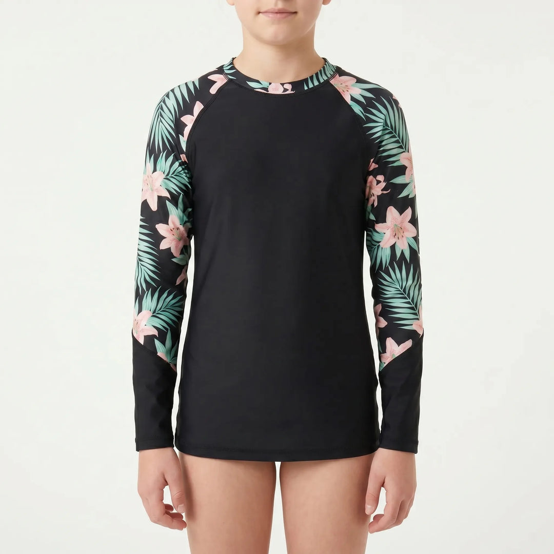 Youth girls' long-sleeve rash guard. Sun protection swim shirt, ideal for active kids' summer adventures.