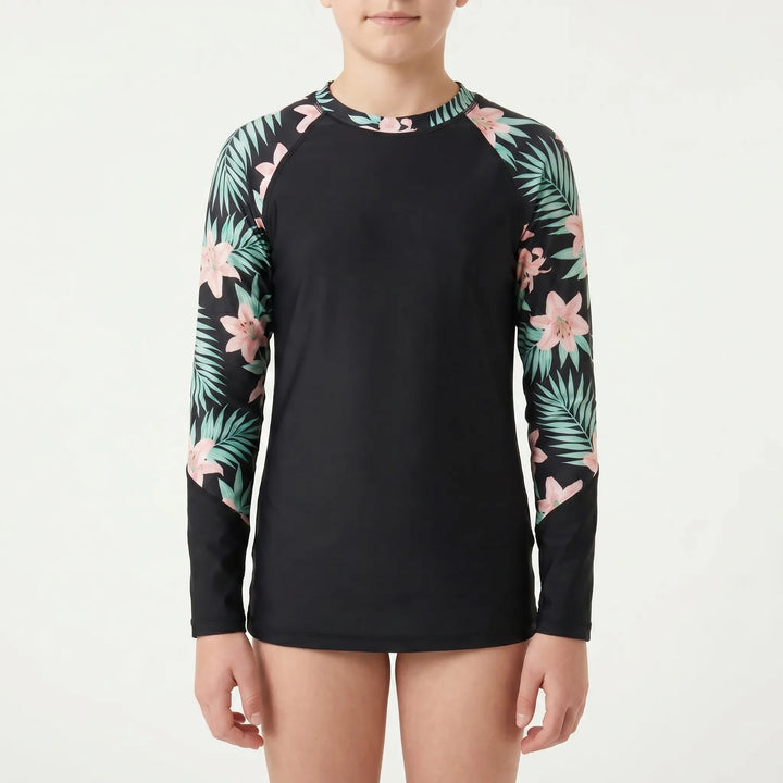 Youth girls' long-sleeve rash guard. Sun protection swim shirt, ideal for active kids' summer adventures.