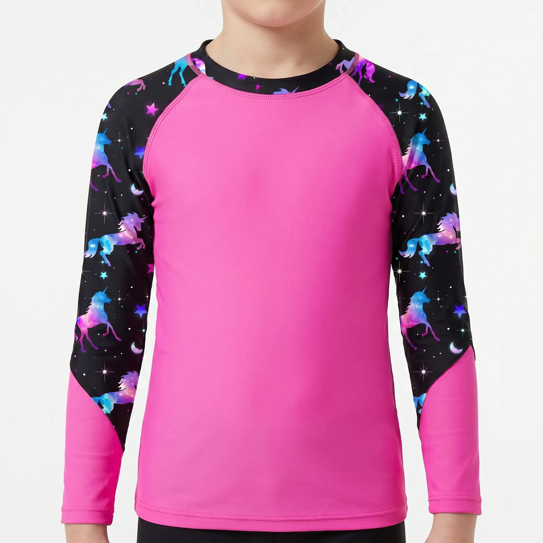 Girls' long-sleeve rash guard. Sun protection swim top for kids' active summer fun & beach wear.