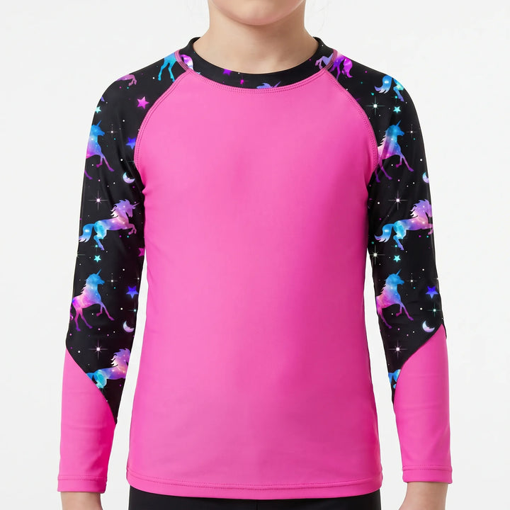 Girls' long-sleeve rash guard. Sun protection swim top for kids' active summer fun & beach wear.