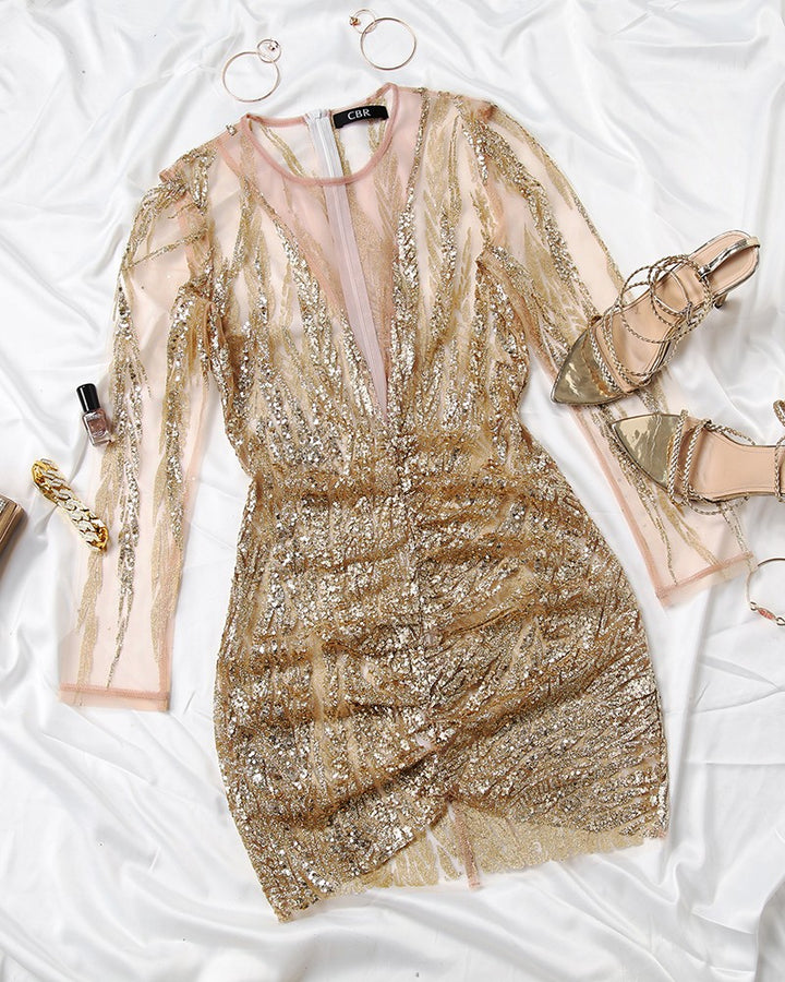 Chic gold bodycon mini dress, a glamorous women's party or cocktail dress. Elegant sleeveless evening wear for any special event.