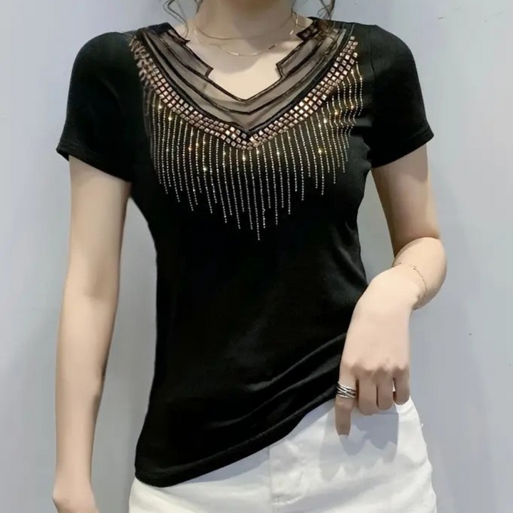 Women's dazzling black sequin V-neck blouse. A fashionable and elegant top for special events.