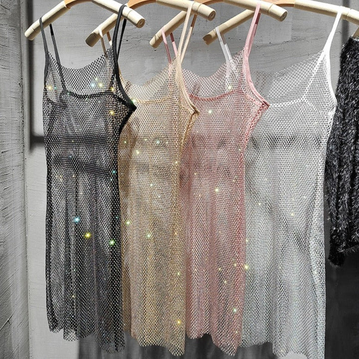 Glamorous women's party dress with shimmering fabric, perfect for evening wear & special occasions.