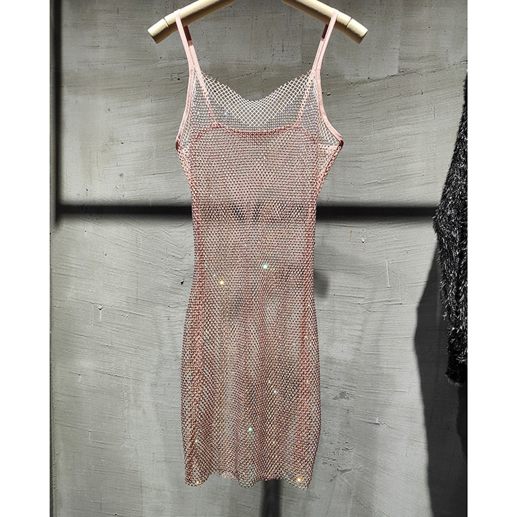 Sparkling women's cocktail dress, ideal for glamorous parties & special occasion evening wear.