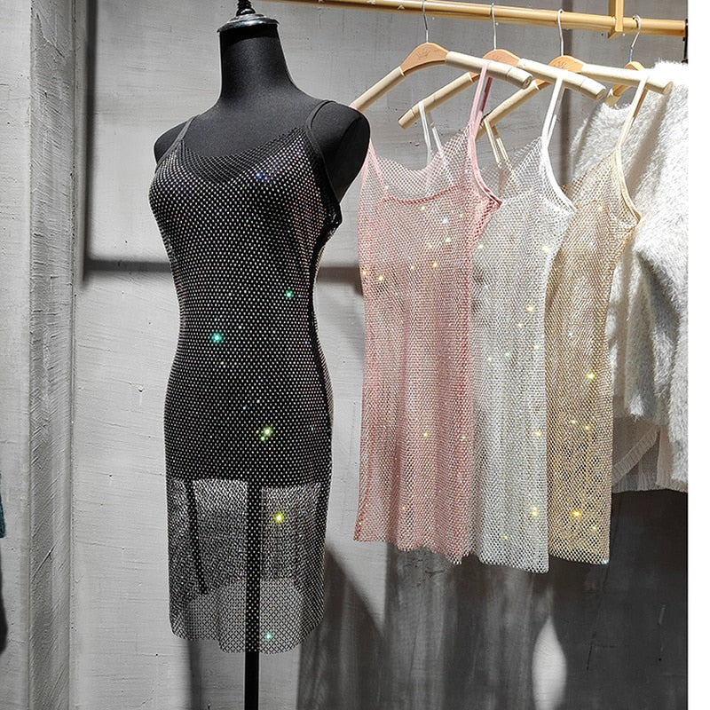 Brilliant women's party dress, shimmering and sparkling for a show-stopping glamorous evening wear look.