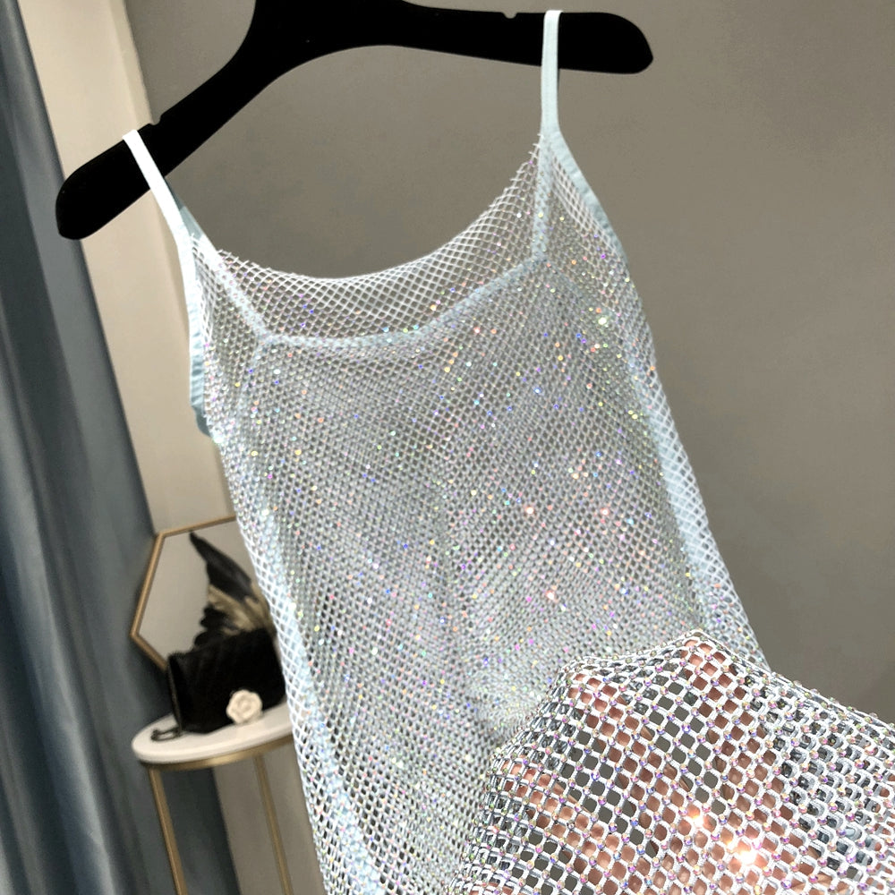 Women's glamorous party dress featuring radiant shimmer & sparkle, ideal for cocktail & evening wear.