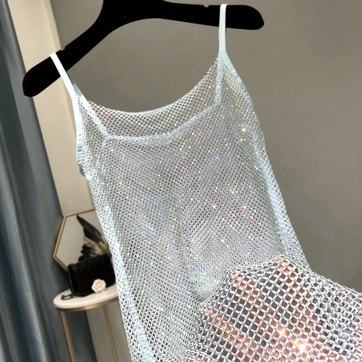 Women's glamorous party dress featuring radiant shimmer & sparkle, ideal for cocktail & evening wear.