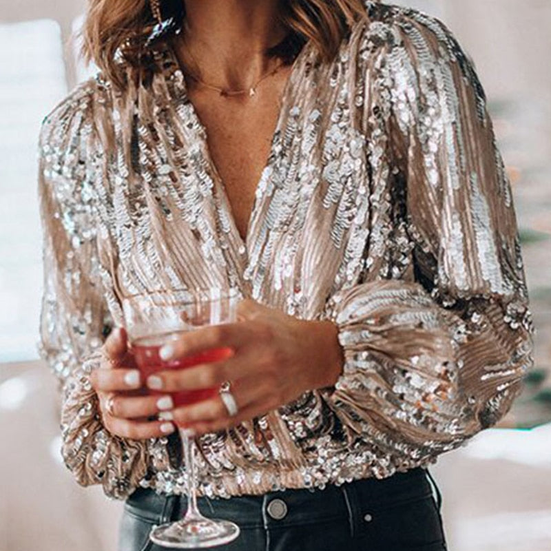 Glamorous women's sequin blouse with long sleeves, perfect for evening wear, parties & festive occasions.