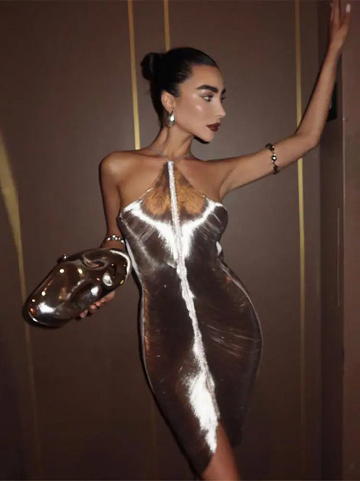 Chic women's metallic mini party dress with a beautiful shimmer, ideal for a night out.