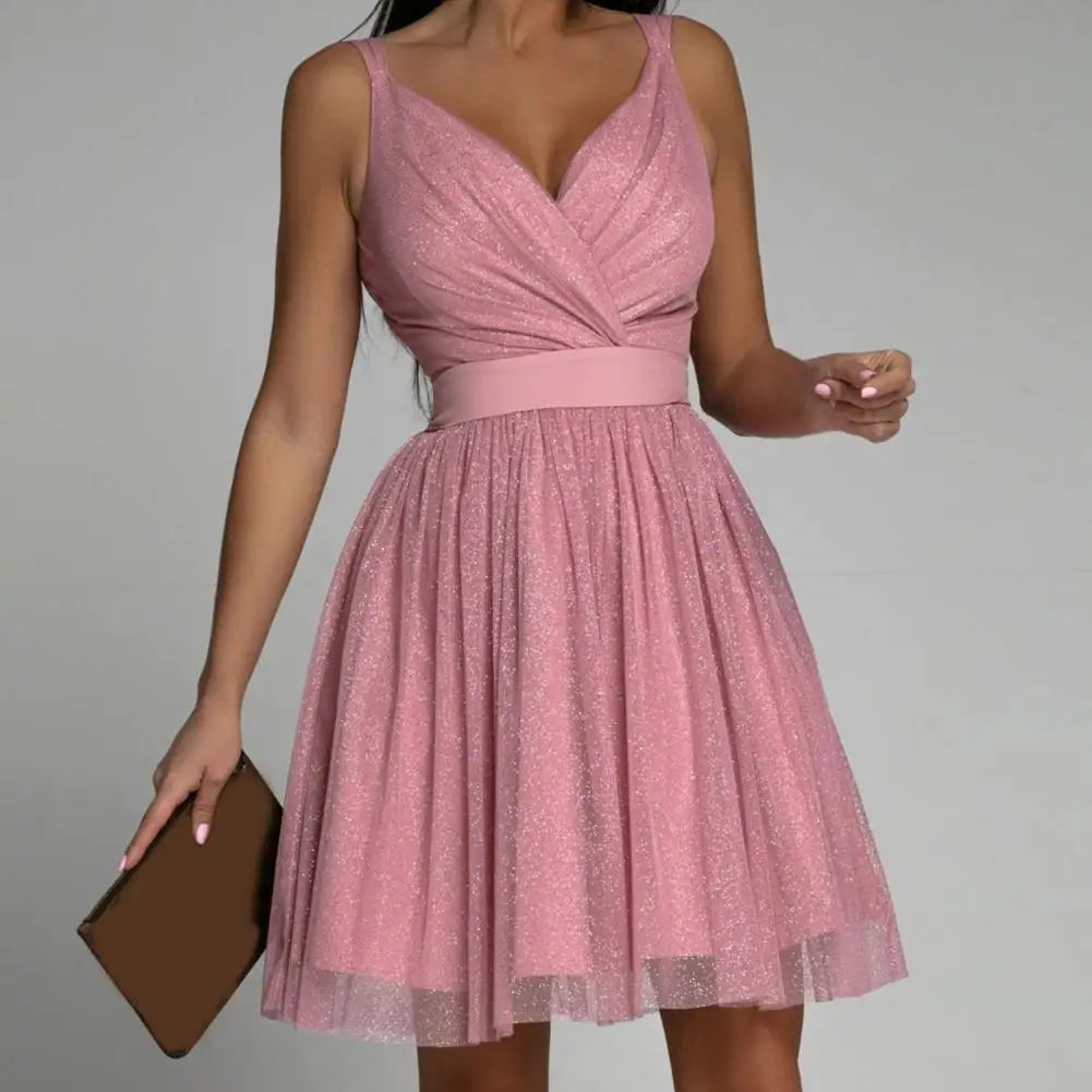Dazzling sequin party dress for women, Seraphina style, with a flattering v-neck and elegant open-back design.