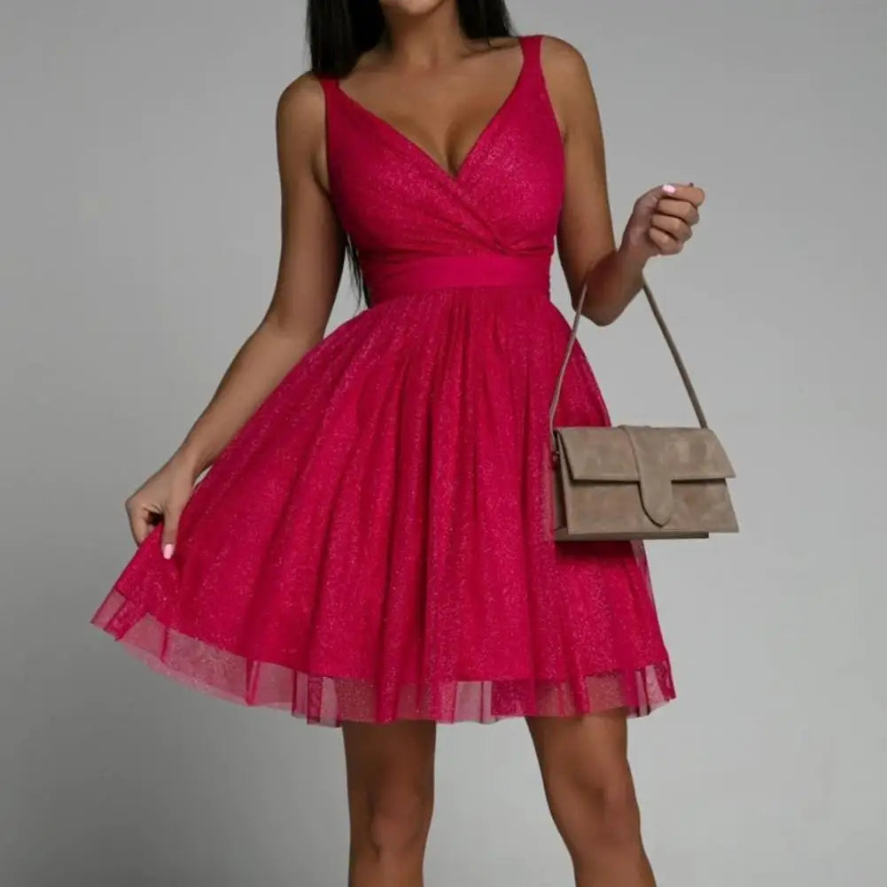 Women's glamorous v-neck sequin party dress, shimmering and sleeveless with an elegant open back for evening events.