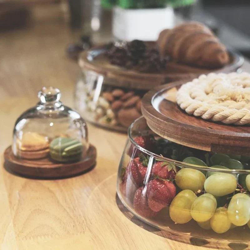 Stylish glass snack bowl with a handcrafted acacia wood lid. Ideal for modern home decor & kitchen organization.