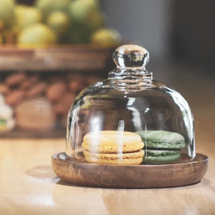 Versatile glass fruit bowl with a beautiful, natural grain acacia wood lid. A chic addition to any kitchen or home.
