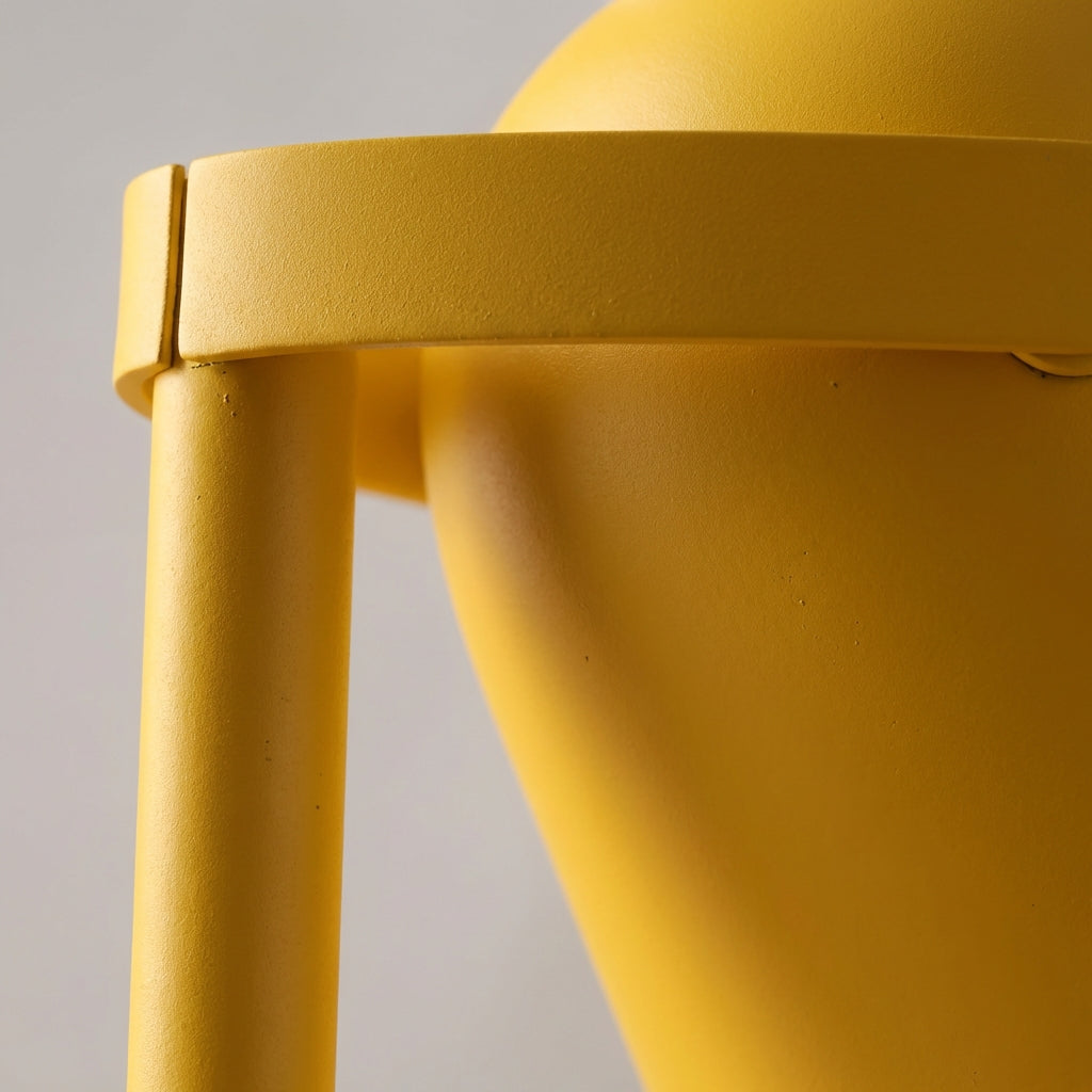 Close-up of Glintor adjustable task lamp's head, showing light source and flexible neck for precise lighting.