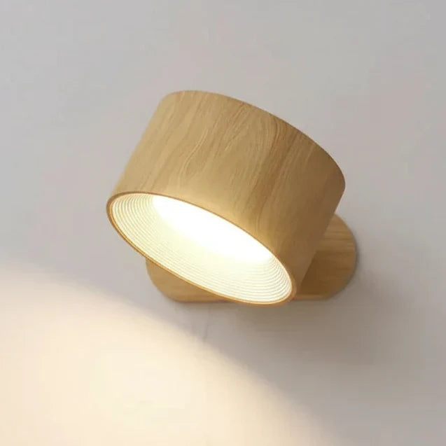 GLOW360 Cordless Pivoting LED Wall Light for modern home lighting; magnetic, rechargeable, touch control.