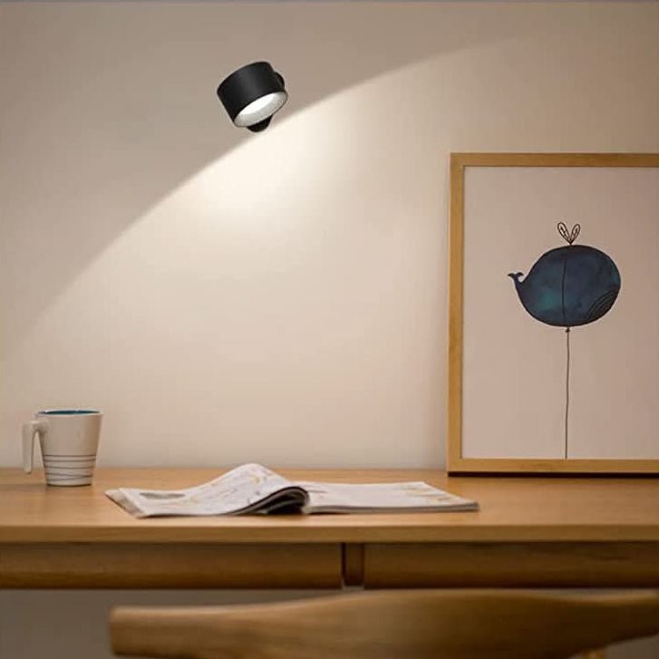 Modern GLOW360 LED wall lamp with pivoting head and touch control for versatile home lighting.