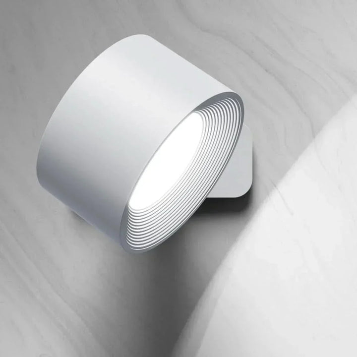 Magnetic GLOW360 LED wall lamp. Cordless, rechargeable, and touch-controlled for versatile modern home lighting.