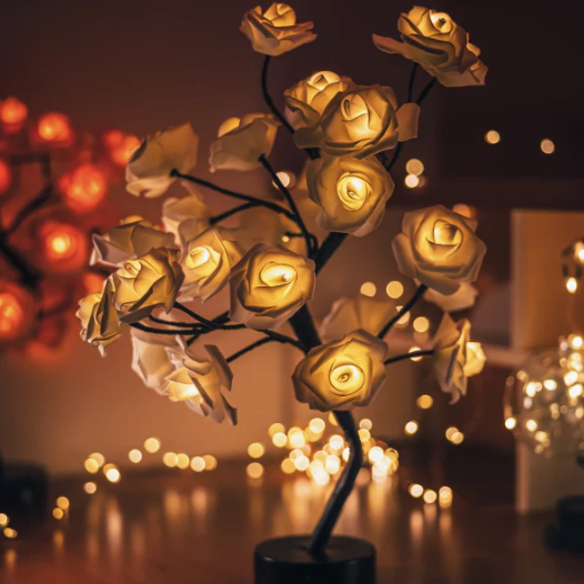 Women's handcrafted floral LED light sculpture, intricate design provides soft, inviting glow