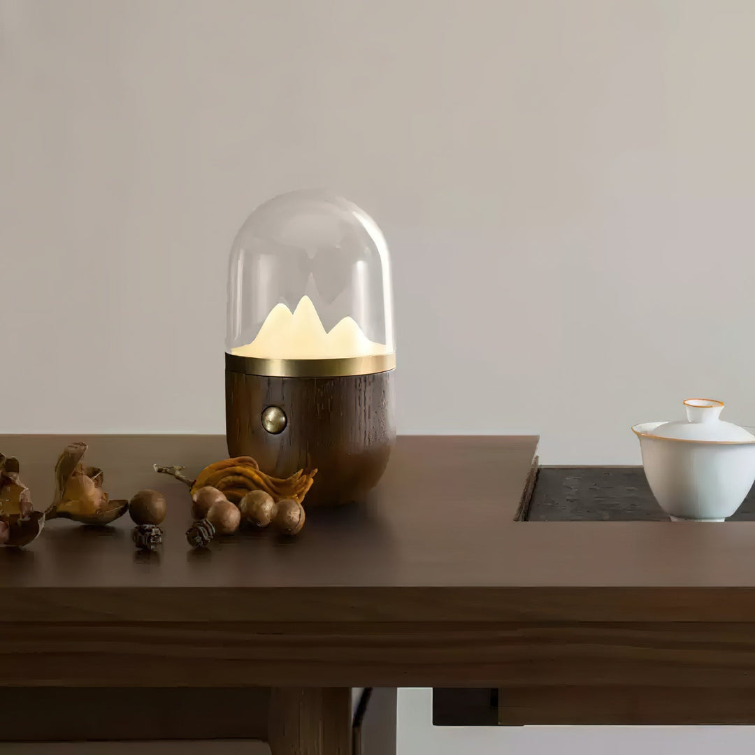 Modern Glowcrest Tabletop Ambient Night Lamp, showcasing its minimalistic design with a wooden base and spherical matte glass
