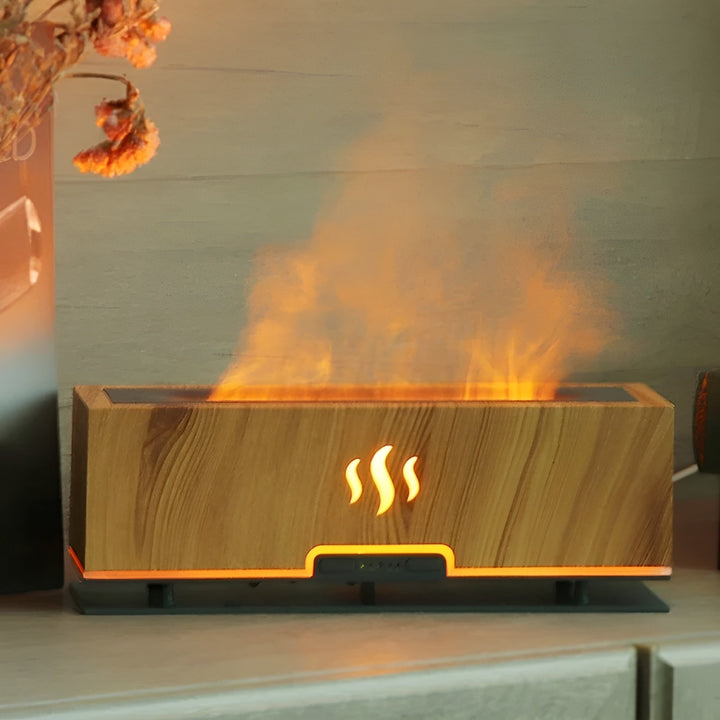 Quiet GlowFlame humidifier & essential oil diffuser with realistic LED flame effect for bedroom relaxation.
