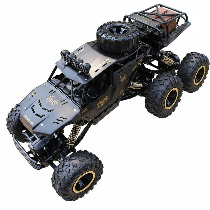 Exciting gold & black 6x6 remote control monster truck, great for kids' toys or adult hobbies. All-terrain.