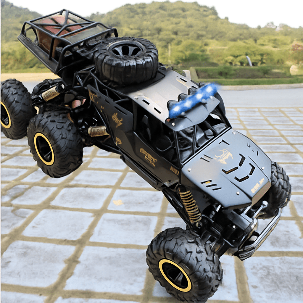 Rechargeable gold & black 6x6 RC monster truck, built for unstoppable off-road adventures. Durable toy vehicle.