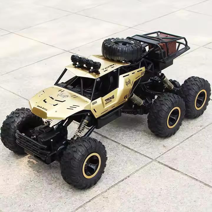 Durable gold & black remote control 6x6 RC monster truck, designed for all-terrain off-road adventure.