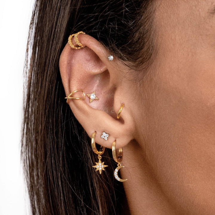 Sterling silver dangle earrings with delicate gold plated moon and star celestial design.