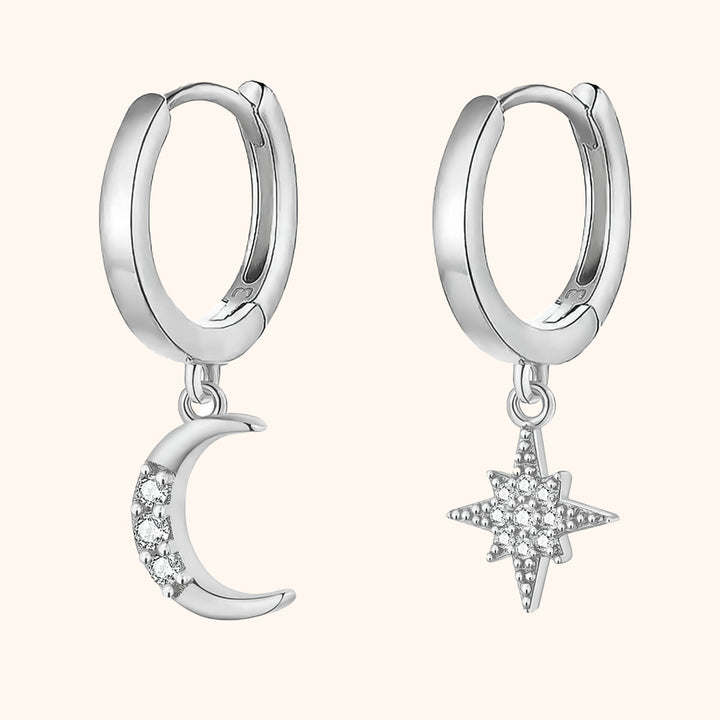 Fashionable women's celestial moon and star dangle earrings, ideal for a stylish look.