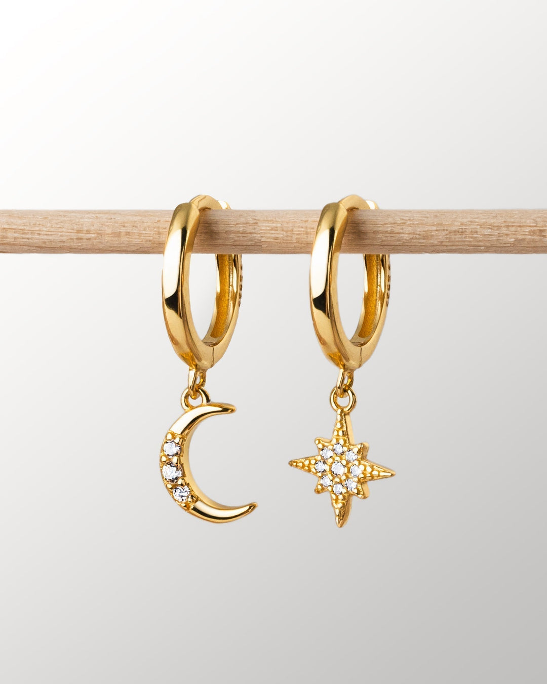 Beautiful gold plated celestial moon & star dangle earrings, a perfect gift for women.