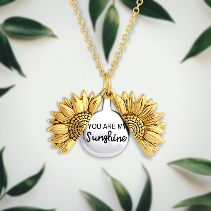 Elegant gold plated sunshine pendant necklace for women. Delicate jewelry for everyday wear & positive energy.