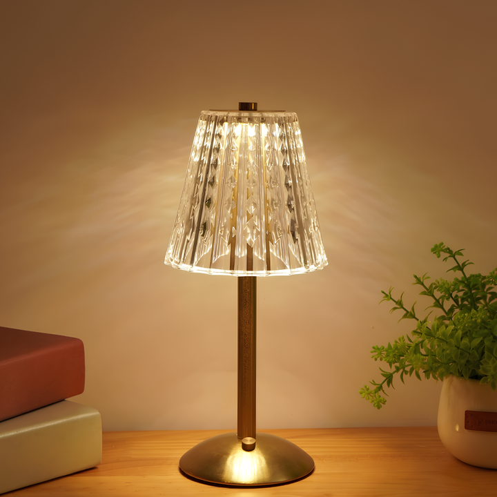 Close-up of golden crystal table lamp, showing exquisite craftsmanship and touch control