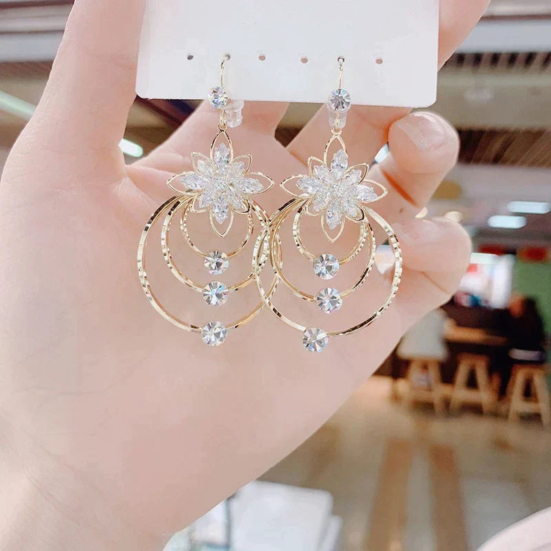 Dazzling golden hoop earrings, a stylish accessory for women's fashion.