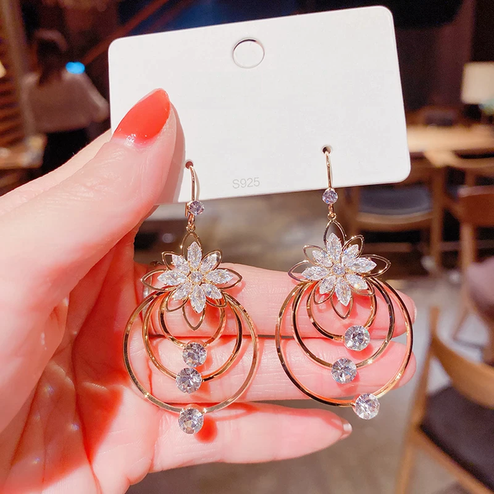 Glamorous golden hoop earrings, a beautiful and elegant jewelry piece.