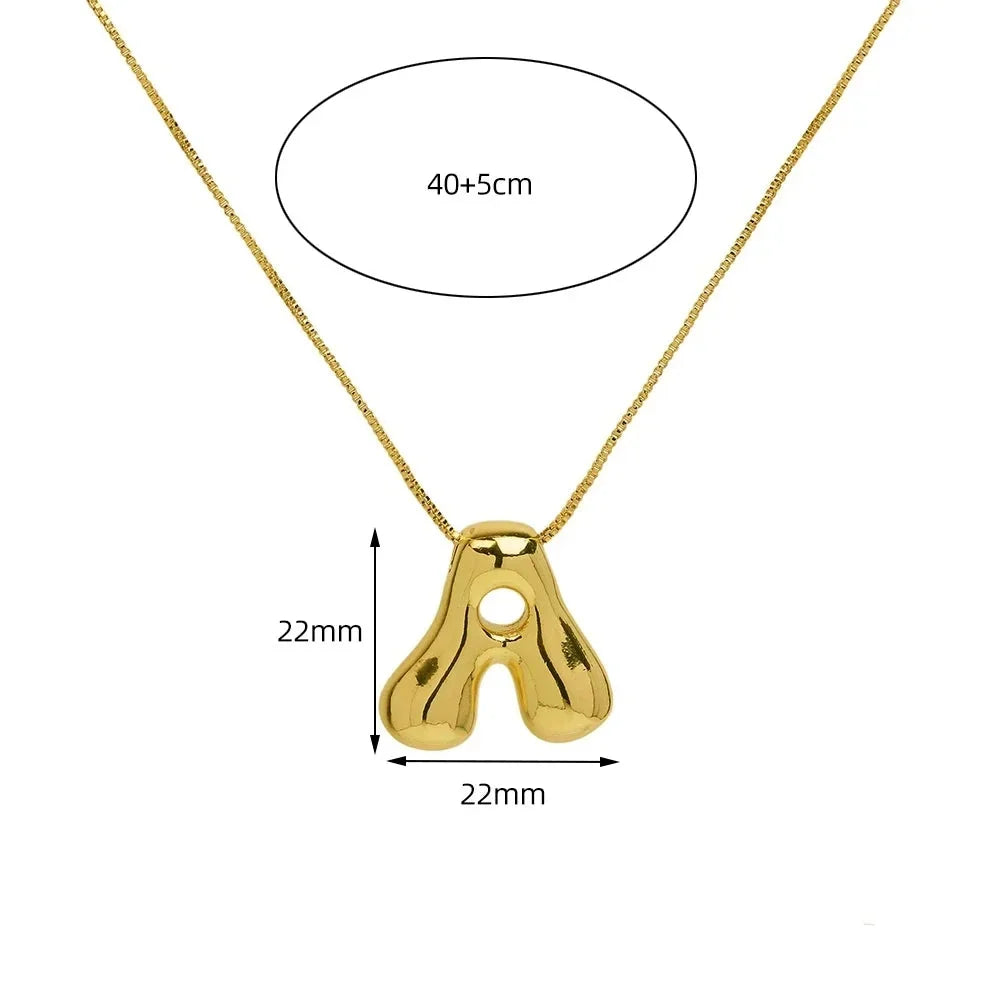 Trendy women's fashion necklace featuring a personalized gold initial letter pendant, durable stainless steel.