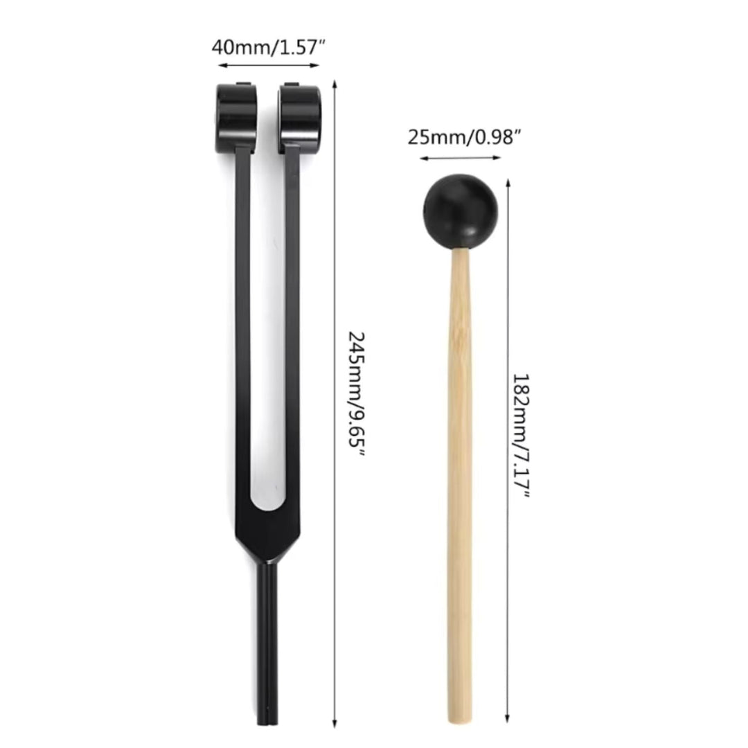 Close-up of a golden tuning fork, designed for sound therapy & meditation.