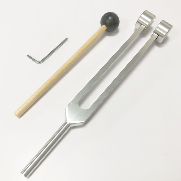 Golden vibrational therapy tools, perfect for meditation & holistic healing.