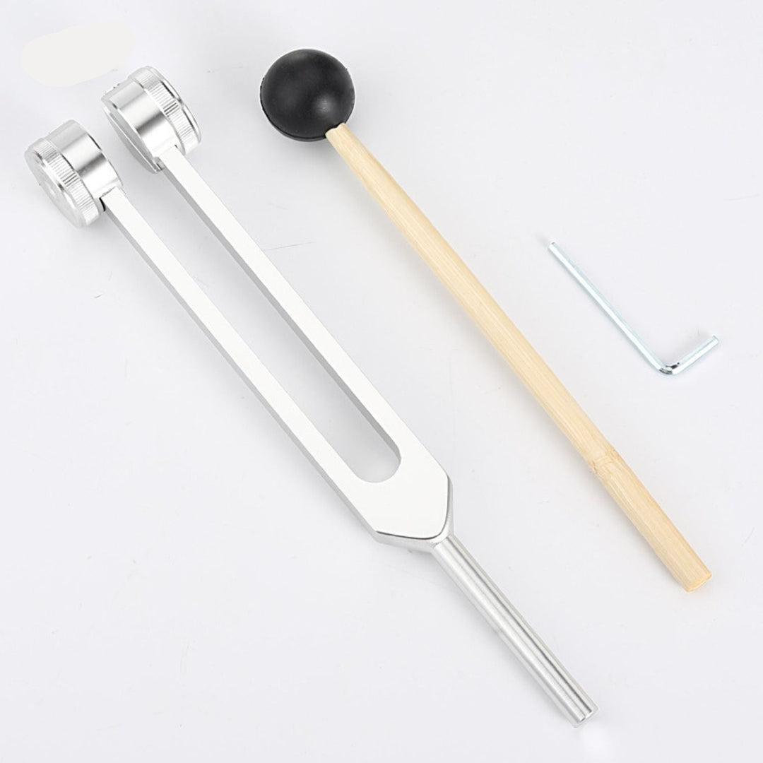 Sound therapy kit featuring golden tuning forks for inner calm & mindfulness.