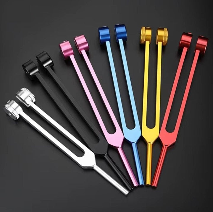 Holistic health tuning forks for relaxation, balance, and spiritual well-being.